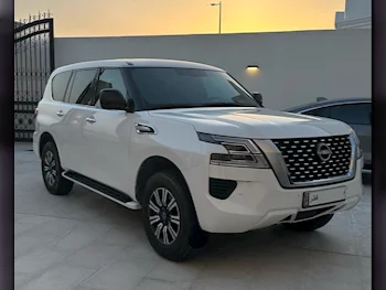 Nissan  Patrol  XE  2023  Automatic  33,345 Km  6 Cylinder  Four Wheel Drive (4WD)  SUV  White  With Warranty