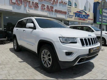 Jeep  Grand Cherokee  Limited  2016  Automatic  23,000 Km  8 Cylinder  Four Wheel Drive (4WD)  SUV  White