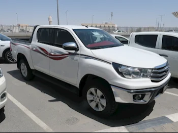 Toyota  Hilux  2020  Automatic  60,000 Km  4 Cylinder  Four Wheel Drive (4WD)  Pick Up  White