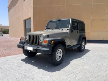 Jeep  Wrangler  Sport  2003  Manual  289,000 Km  6 Cylinder  Four Wheel Drive (4WD)  SUV  Olive Green