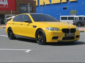 BMW  M-Series  5  2013  Automatic  162,000 Km  8 Cylinder  Rear Wheel Drive (RWD)  Sedan  Yellow