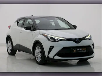 Toyota  C-HR  HIBRID  2021  Automatic  30,000 Km  4 Cylinder  Front Wheel Drive (FWD)  Hatchback  Pearl  With Warranty