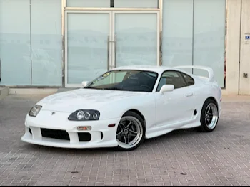 Toyota  Supra  2002  Manual  32,000 Km  4 Cylinder  Rear Wheel Drive (RWD)  Coupe / Sport  White