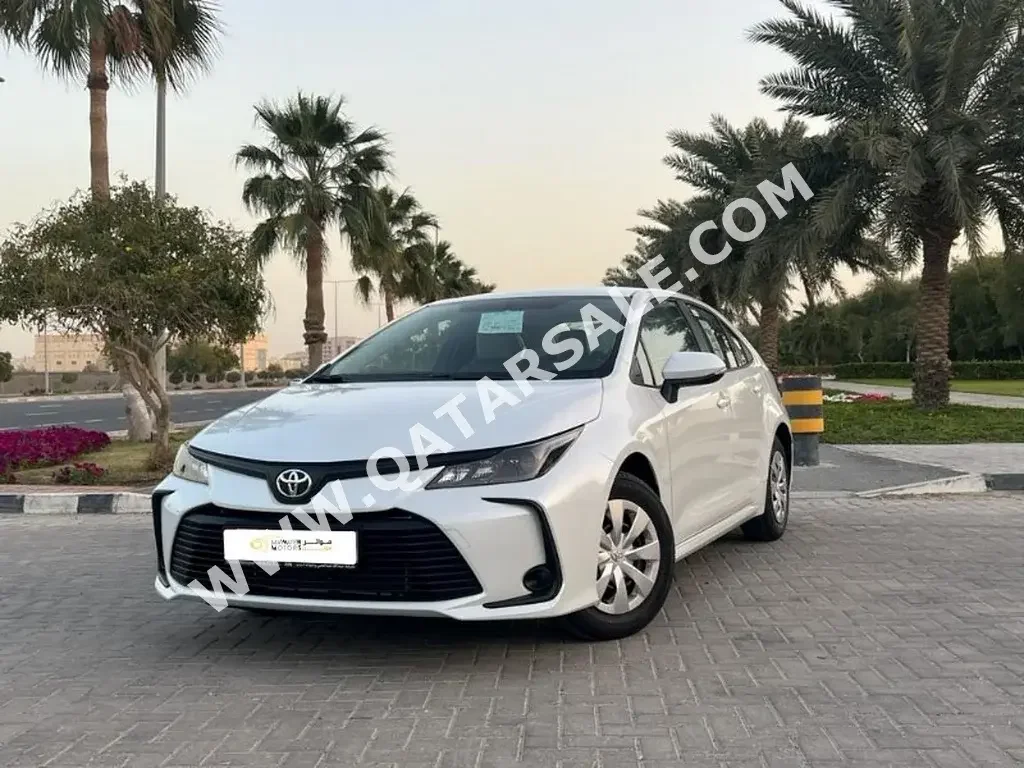 Toyota  Corolla  2023  Automatic  0 Km  4 Cylinder  Front Wheel Drive (FWD)  Sedan  White  With Warranty