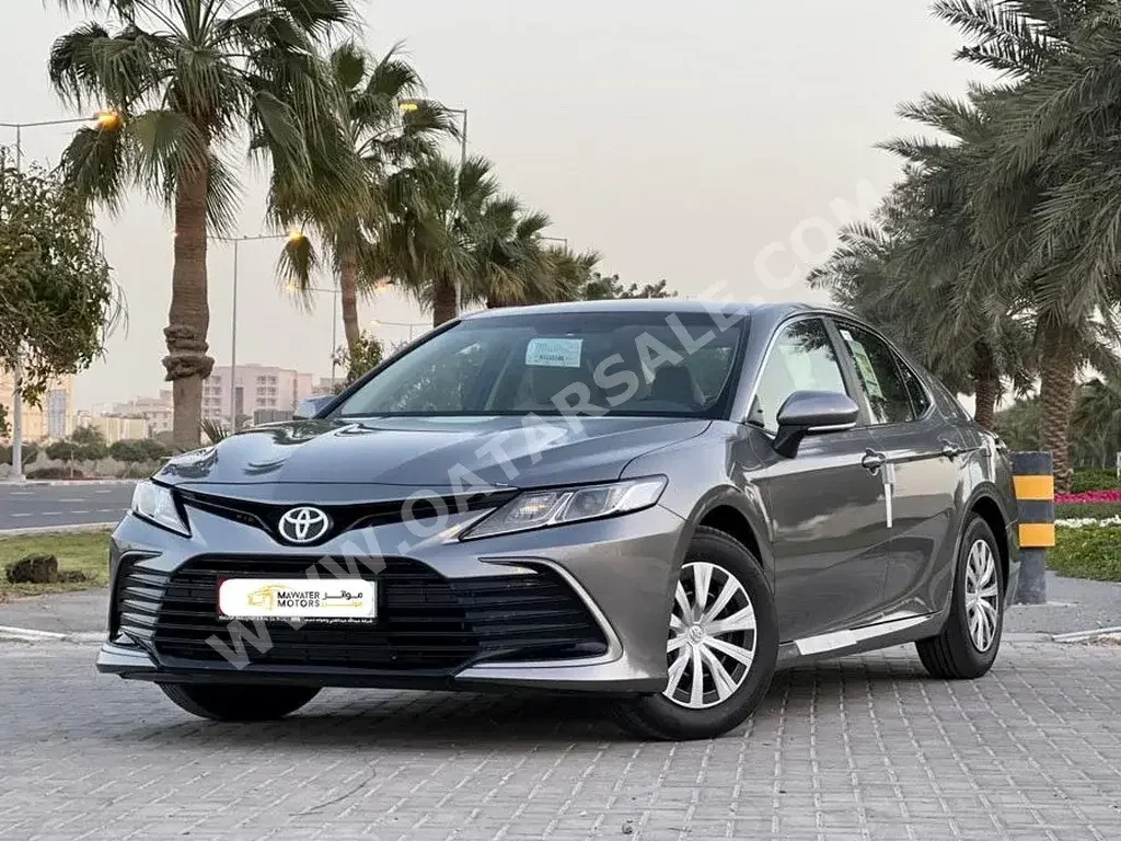 Toyota  Camry  LE  2022  Automatic  0 Km  4 Cylinder  Front Wheel Drive (FWD)  Sedan  Gray  With Warranty