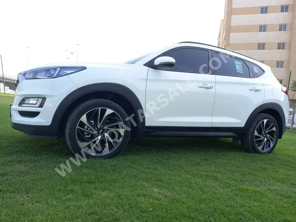 Hyundai  Tucson  4 Cylinder  SUV 4x4  White  2021
