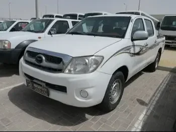 Toyota  Hilux  2010  Automatic  229,000 Km  4 Cylinder  Front Wheel Drive (FWD)  Pick Up  White  With Warranty