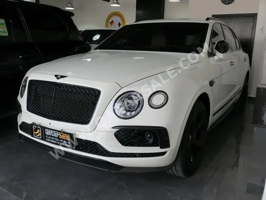 Bentley  Bentayga  2018  Automatic  28,000 Km  12 Cylinder  Four Wheel Drive (4WD)  SUV  White  With Warranty