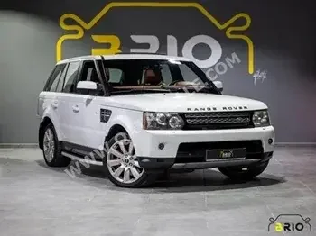 Land Rover  Range Rover  Sport Super charged  2013  Automatic  113,000 Km  8 Cylinder  Four Wheel Drive (4WD)  SUV  White  With Warranty