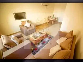 2 Bedrooms  Apartment  For Rent  in Doha -  Al Mansoura  Semi Furnished
