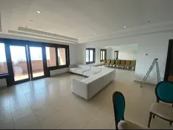 2 Bedrooms  Apartment  For Sale  in Doha -  The Pearl  Semi Furnished