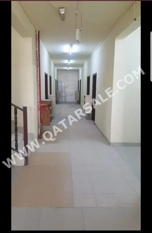 Buildings, Towers & Compounds - Labour building  - Doha  - Industrial Area  For Rent
