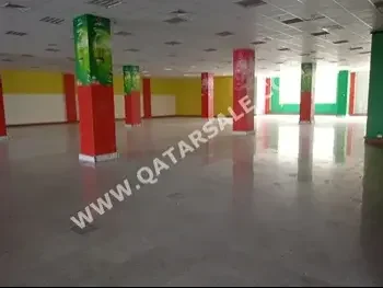 محلات تجارية - غير مفروشة  - الدوحة  للايجار  - المطار القديم