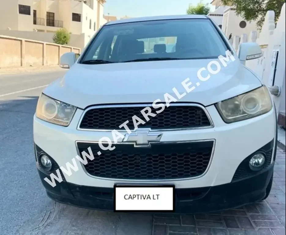Chevrolet  Captiva  LT  2012  Automatic  90,200 Km  4 Cylinder  All Wheel Drive (AWD)  SUV  Pearl