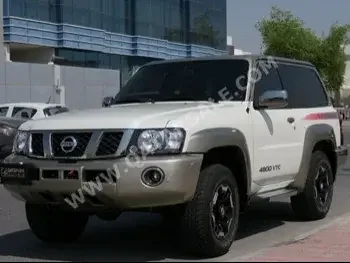Nissan  Patrol  Super Safari  2021  Automatic  37,000 Km  6 Cylinder  Four Wheel Drive (4WD)  SUV  White  With Warranty