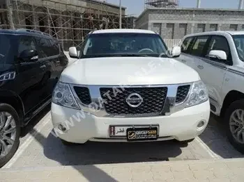 Nissan  Patrol  LE  2010  Automatic  190,000 Km  8 Cylinder  Four Wheel Drive (4WD)  SUV  White  With Warranty