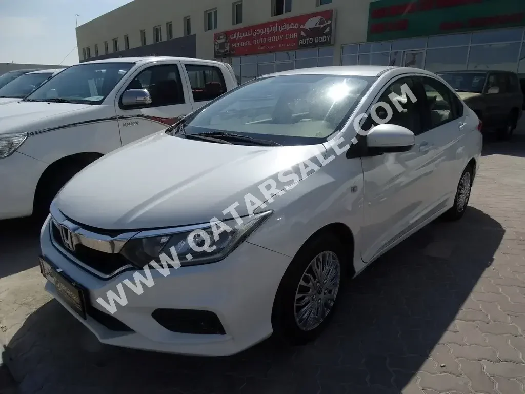 Honda  City  2018  Automatic  195,000 Km  4 Cylinder  Front Wheel Drive (FWD)  Sedan  White  With Warranty