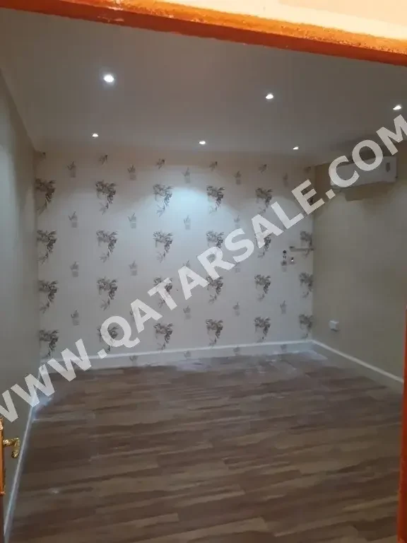 1 Bedrooms  Apartment  For Rent  in Doha -  Al Kharayej  Not Furnished