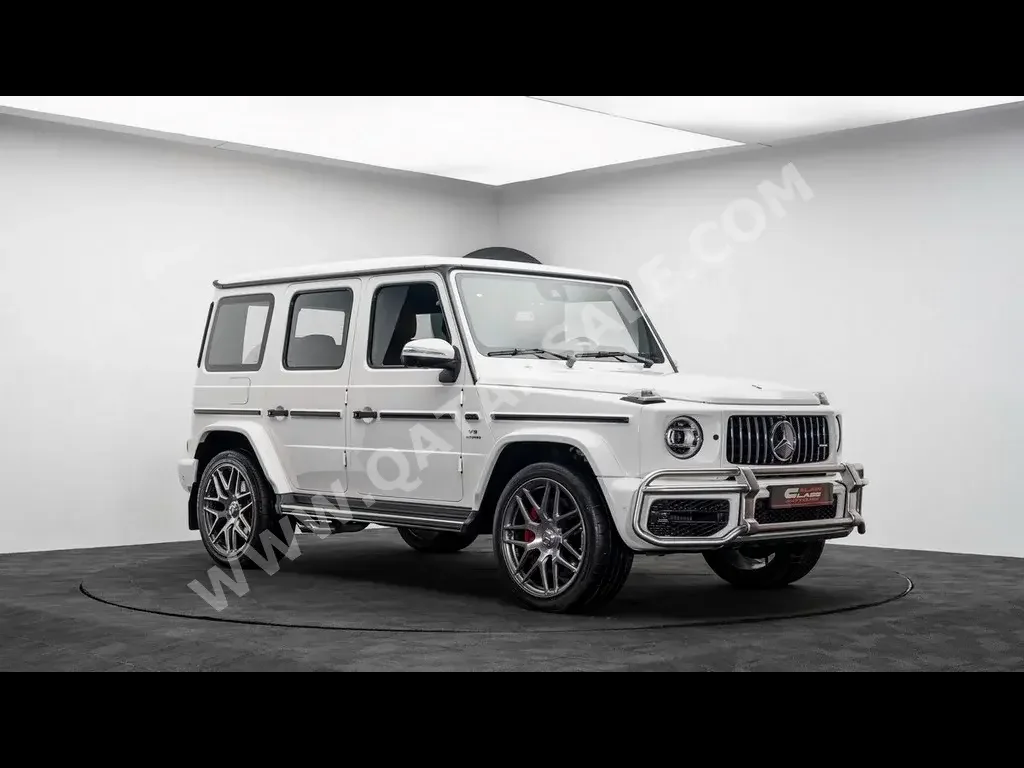 Mercedes-Benz  G-Class  63 AMG  2020  Automatic  9,928 Km  8 Cylinder  Four Wheel Drive (4WD)  SUV  White  With Warranty