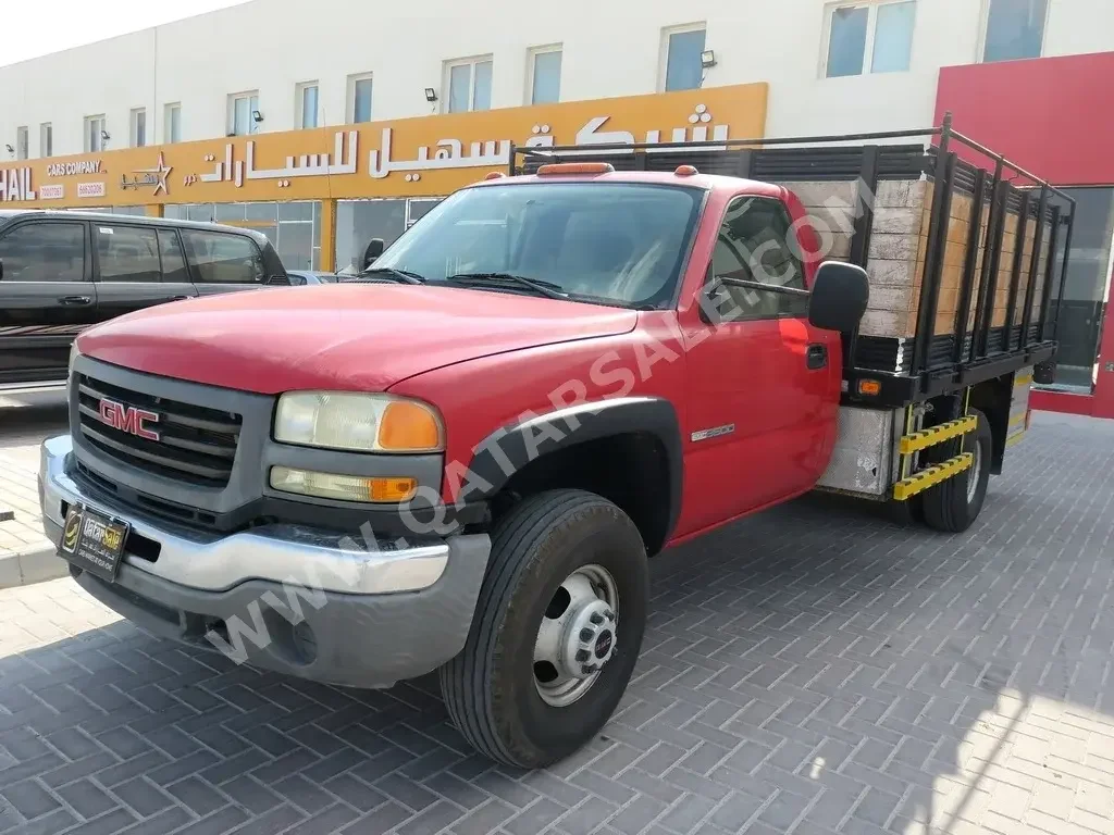 GMC  Sierra  3500  2006  Manual  133,000 Km  8 Cylinder  Four Wheel Drive (4WD)  Pick Up  Red  With Warranty