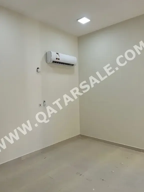 2 Bedrooms  Apartment  For Rent  in Doha -  Al Kharatiyat  Not Furnished