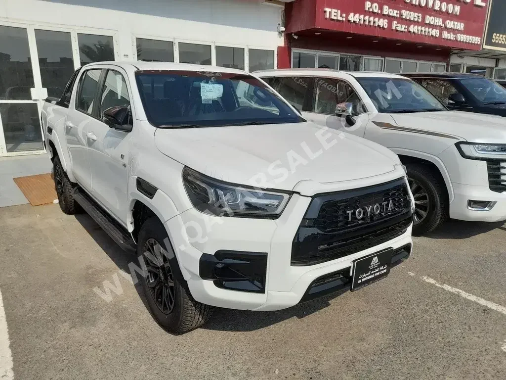 Toyota  Hilux  GR Sport  2023  Automatic  0 Km  6 Cylinder  Four Wheel Drive (4WD)  Pick Up  White  With Warranty