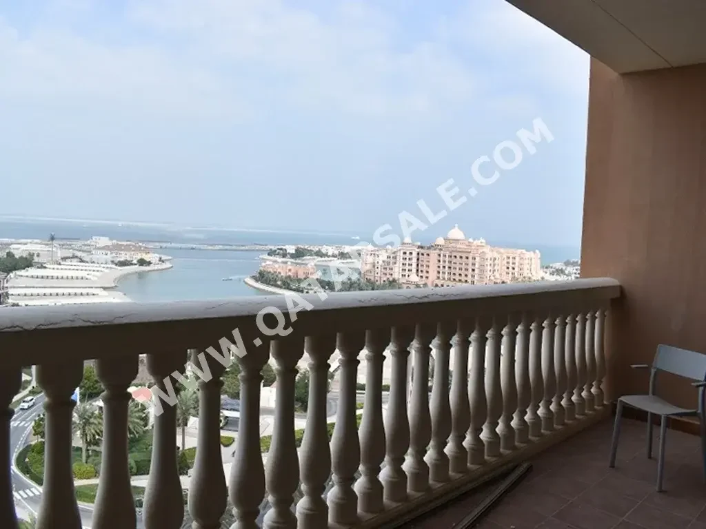 3 Bedrooms  Apartment  For Rent  in Doha -  The Pearl  Semi Furnished