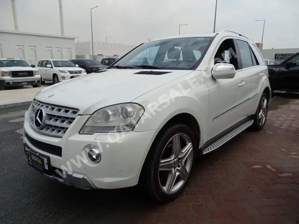 Mercedes-Benz  ML  350  2009  Automatic  100,000 Km  6 Cylinder  Four Wheel Drive (4WD)  SUV  White  With Warranty