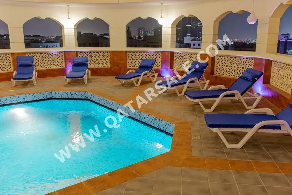 2 Bedrooms  Hotel apart  For Rent  in Doha -  Fereej Bin Mahmoud  Fully Furnished