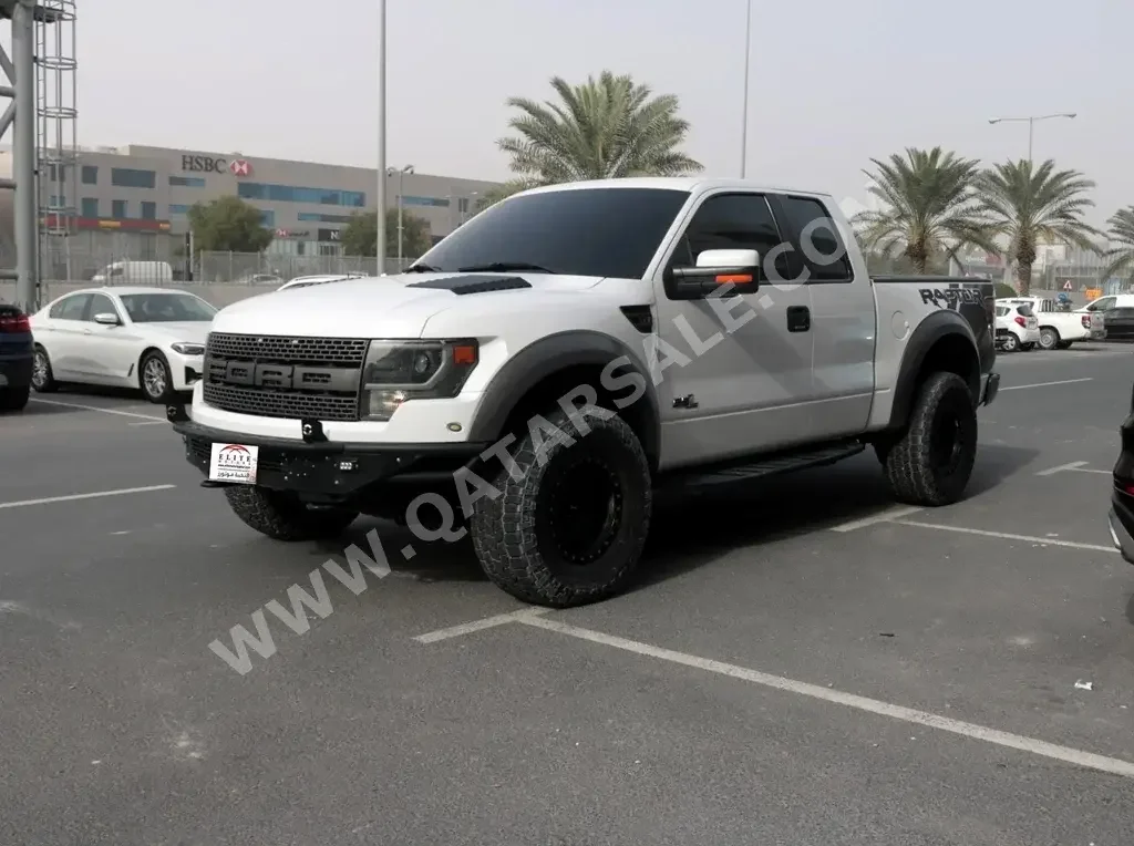 Ford  Raptor  SVT  2014  Automatic  139,000 Km  8 Cylinder  Four Wheel Drive (4WD)  Pick Up  White  With Warranty