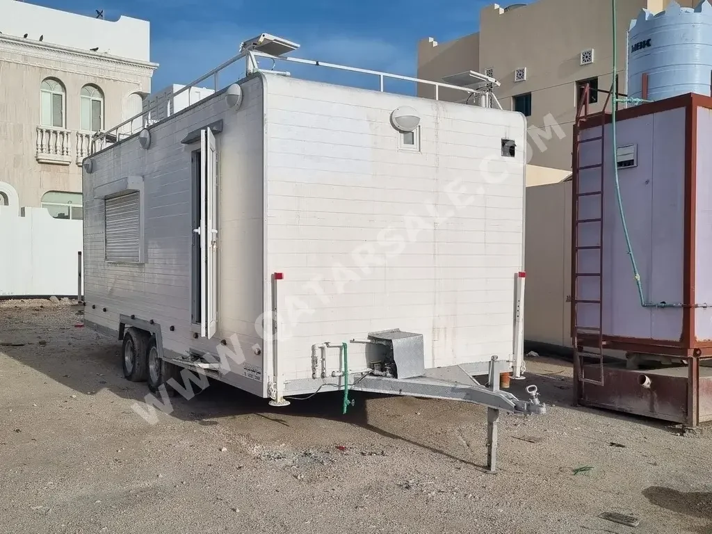 Caravan - 2014  - White  -Made in Qatar